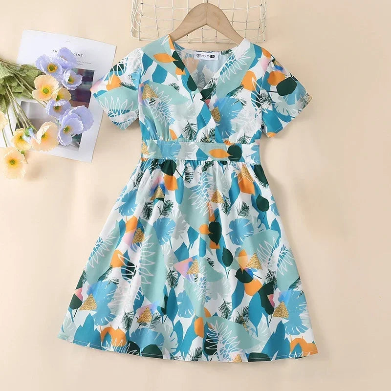 Área de férias casal olhar roupas mãe filha vestidos pai filho conjuntos família combinando roupas de praia férias pai-filho